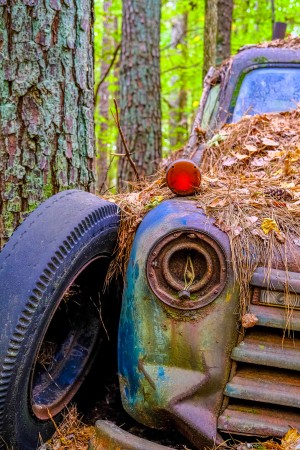 Missing Headlight and Bald Tire